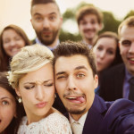 photodune 11485392 newlyweds with friends taking selfie s